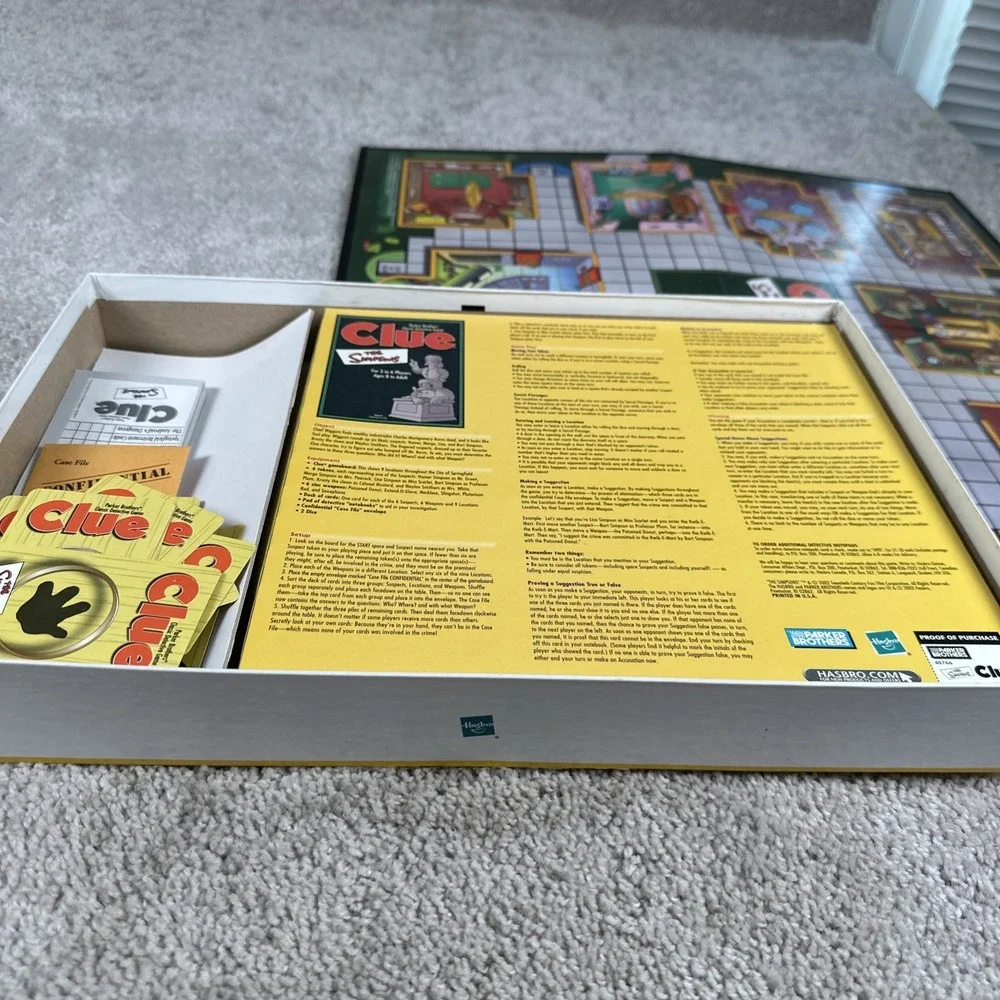 The Simpsons CLUE Parker Brothers Classic Detective Board Game 2002